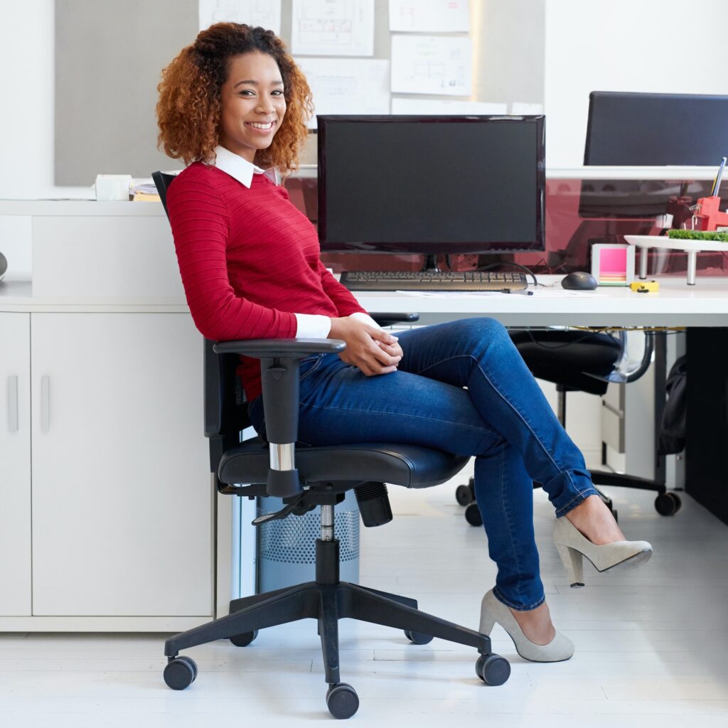 Shes confident and creative. Portrait of a young designer sitting at her workstation in an office.